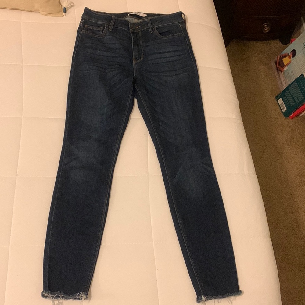 Great pair of very gently worn CJLA dark rinse jeans with frayed hem.